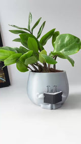 3D - Printed Crying Plant Pot in Gray Plastic